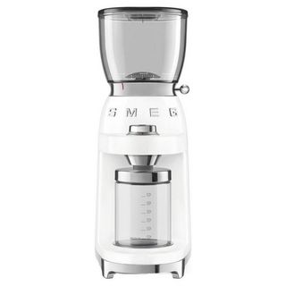 A white coffee grinder from appliance company Smeg 