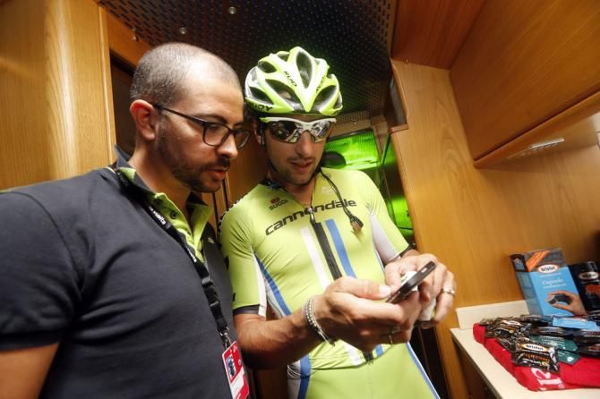 Oscar Gatto has a few words with press officer Paolo Barbieri