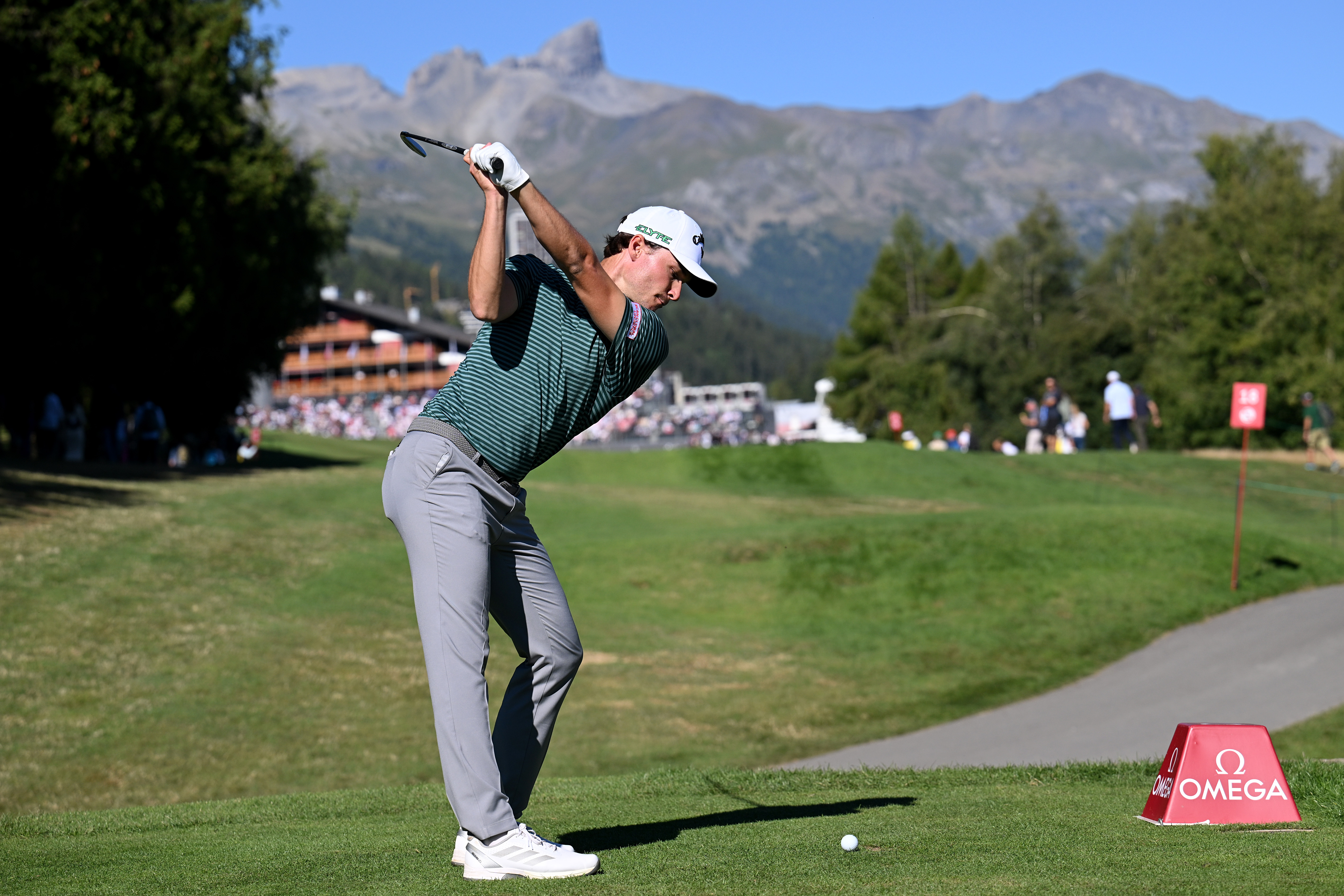 Rasmus Hojgaard hits a shot at the 18th