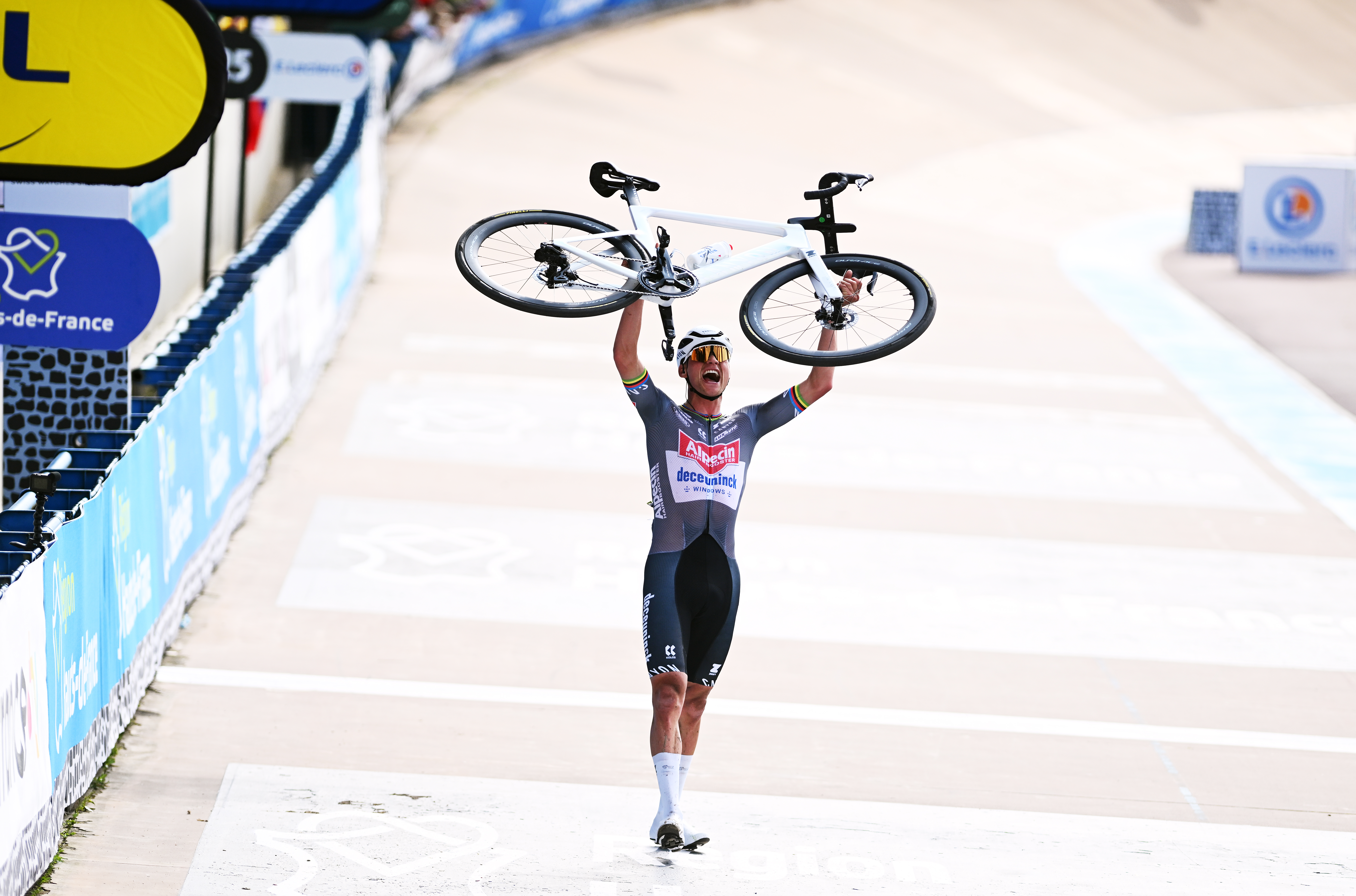  Mathieu Van Der Poel celebrates at the finish line as the race winner in the Roubaix Velodrome (Photo by Luc Claessen/Getty Images)