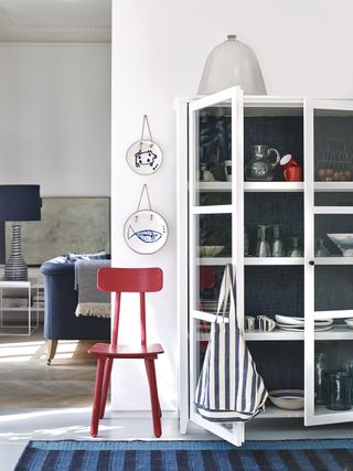 White cabinet with blue interior