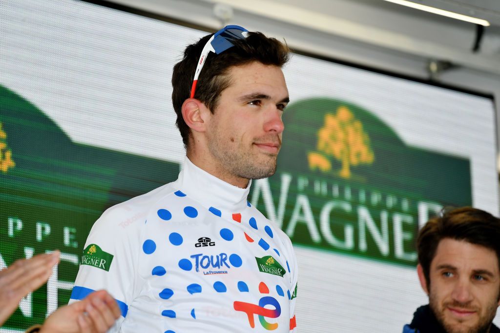 MANOSQUE FRANCE FEBRUARY 12 Paul Ourselin of France and Team Total Energies celebrates winning the Polka Dot Mountain Jersey on the podium ceremony after the 6th Tour de La Provence 2022 Stage 2 a 1806km stage from Arles to Manosque 417m TDLP22 on February 12 2022 in Manosque France Photo by Luc ClaessenGetty Images