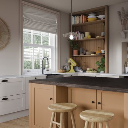 Magnet French Clay traditional kitchen with dark wood worktop.
