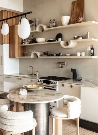 floating kitchen shelves with curved notches for wall sconces