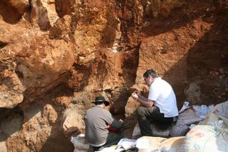 Darren Curnoe (right) and Andy Herries (left) excavating at Maludong in 2008.