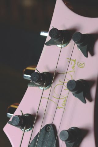 The headstock of the 1989 PRS Custom 24 “Bonni Pink” guitar