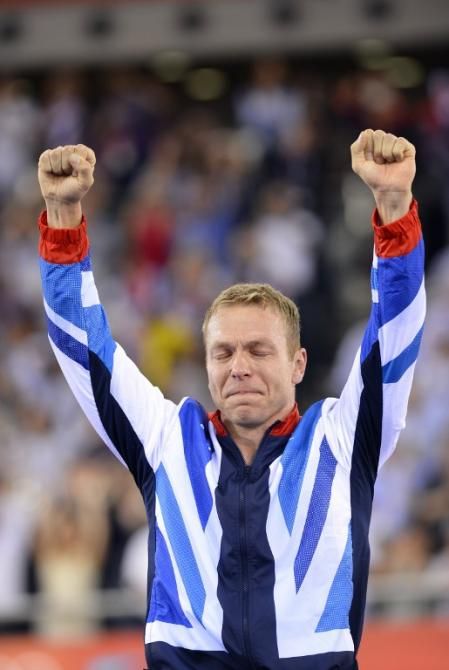An emotional Chris Hoy on the podium after winning gold in the men's keirin.