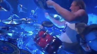Danny Carey and drum tech swap snare drum