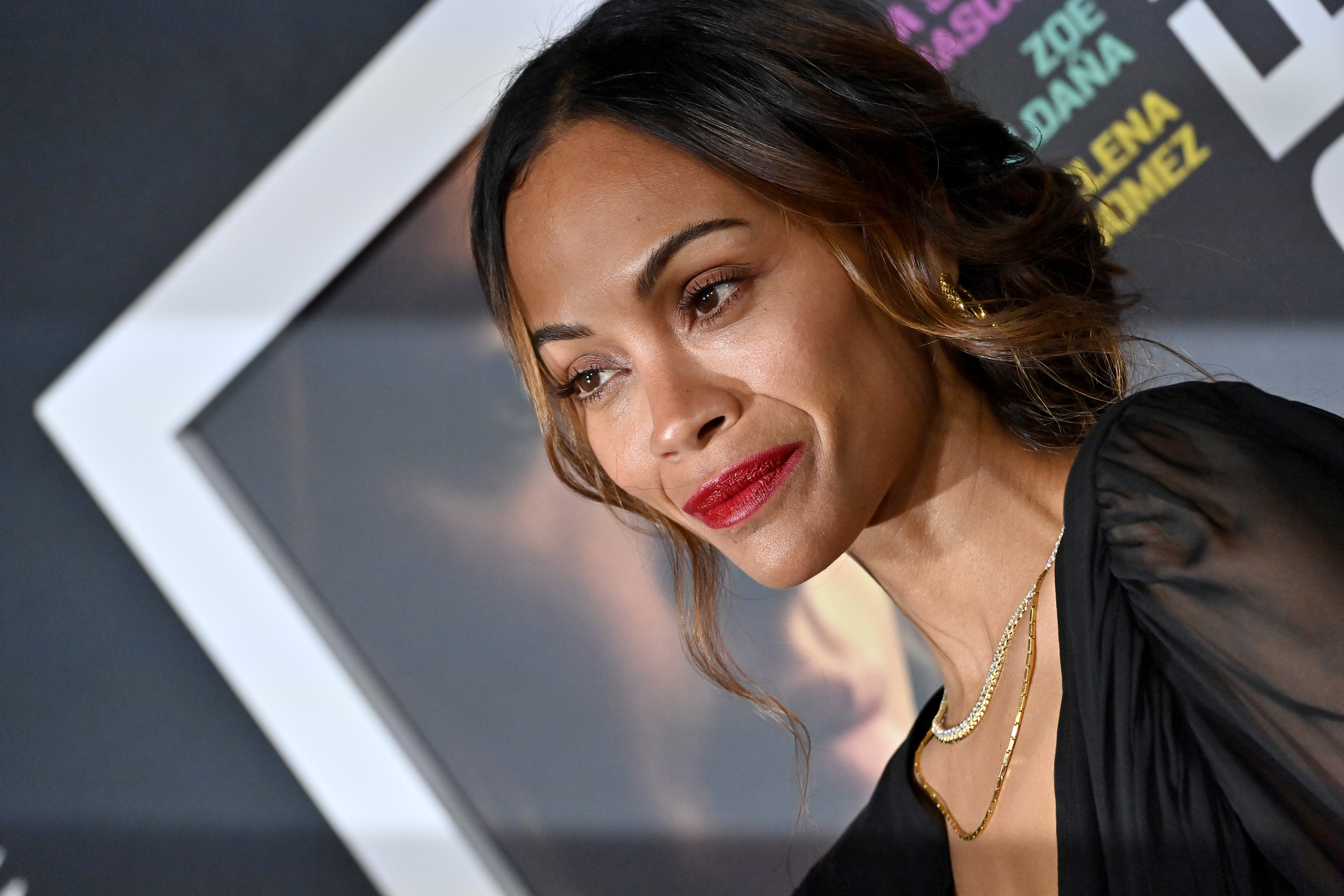 Zoe Salda&amp;ntilde;a attending an event