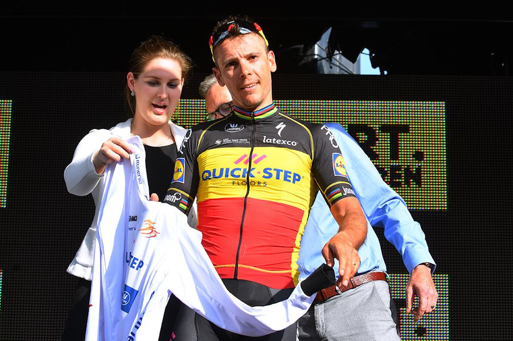 Philippe Gilbert on the podium after winning stage 1 at Three Days of De Panne