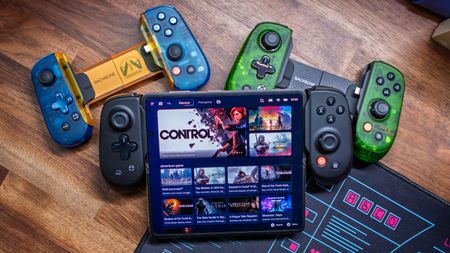 GameHub running on Magic V5 connected to Backbone Pro with Backbone One and Backbone Pro Xbox Edition in background