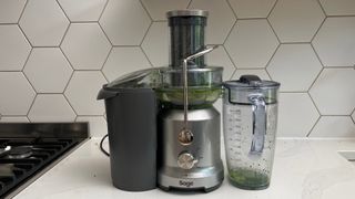 Breville the Juice Fountain Cold on a kitchen countertop used to juice Kale