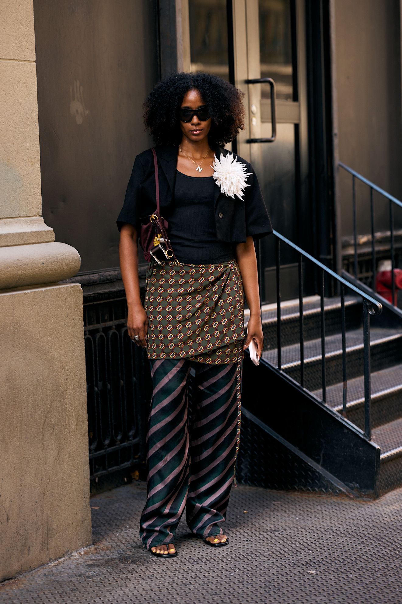 Naomi Elizee wearing the Dries Van Noten patterned jacquard pants.