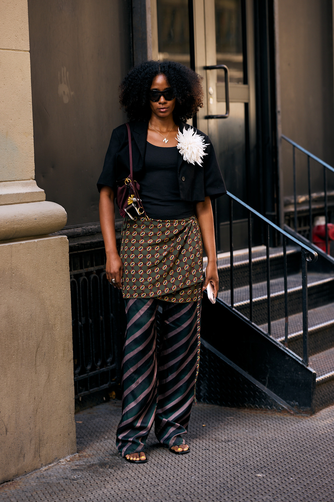Naomi Elizee wearing the Dries Van Noten patterned jacquard pants.