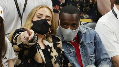 phoenix, arizona july 17 singer adele looks on next to rich paul during the first half in game five of the nba finals between the milwaukee bucks and the phoenix suns at footprint center on july 17, 2021 in phoenix, arizona note to user user expressly acknowledges and agrees that, by downloading and or using this photograph, user is consenting to the terms and conditions of the getty images license agreement photo by christian petersengetty images