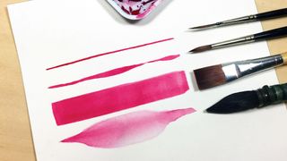 Four different watercolour brushes next to the type of stroke they make
