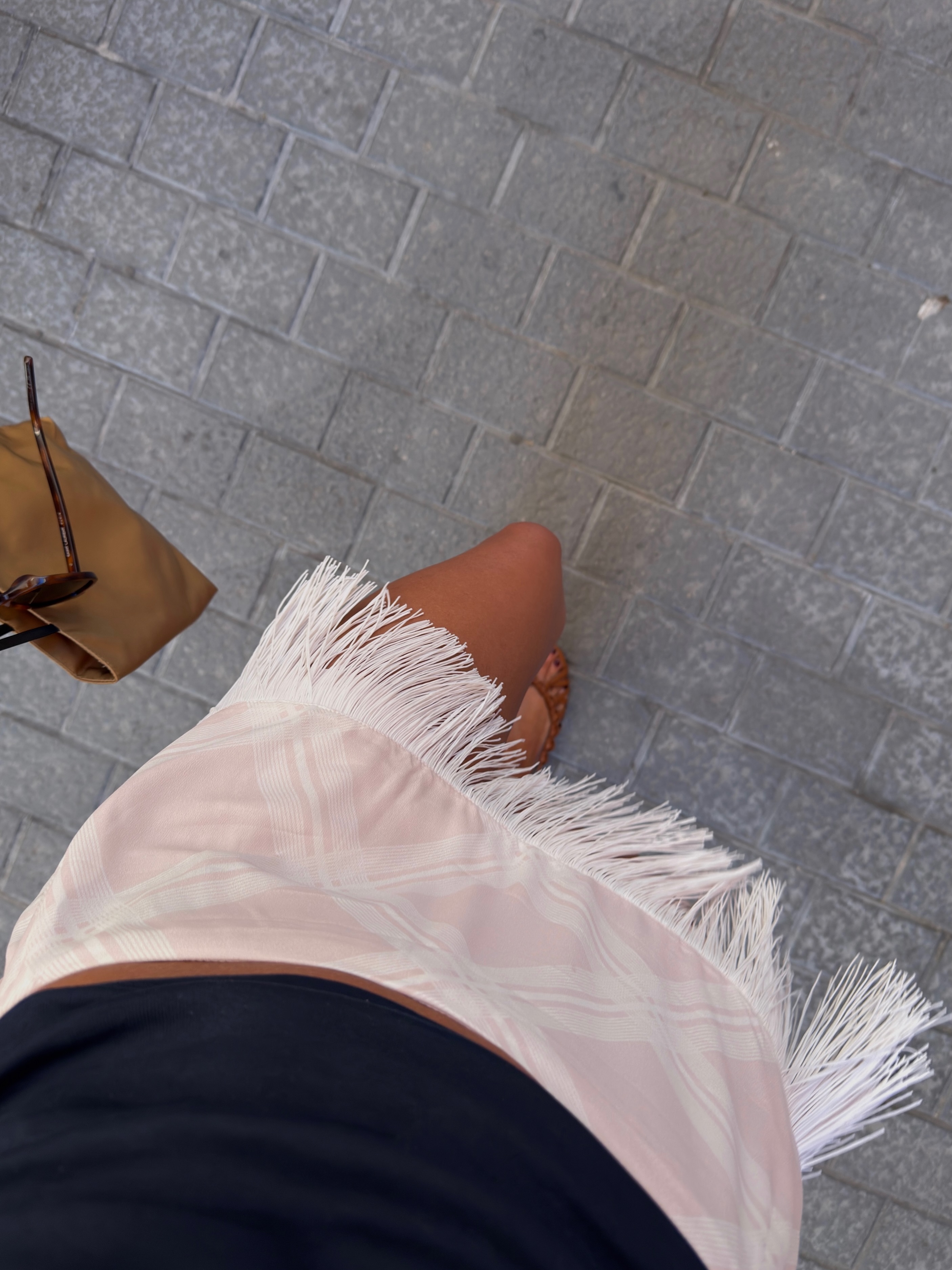 A woman wearing beaded skirt trend for summer 2026.