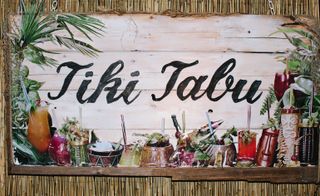 Name plate of Tiki Tabu rooftop cocktail bar