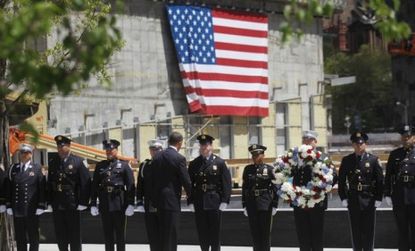 President Obama greets 9/11 first responders last week: Two New York lawmakers say the $50 million reward for tracking down Osama bin Laden should be shared among those directly affected by 9