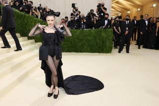 Maisie Williams was a gothic queen as she arrived at the Met Gala in Thom Browne