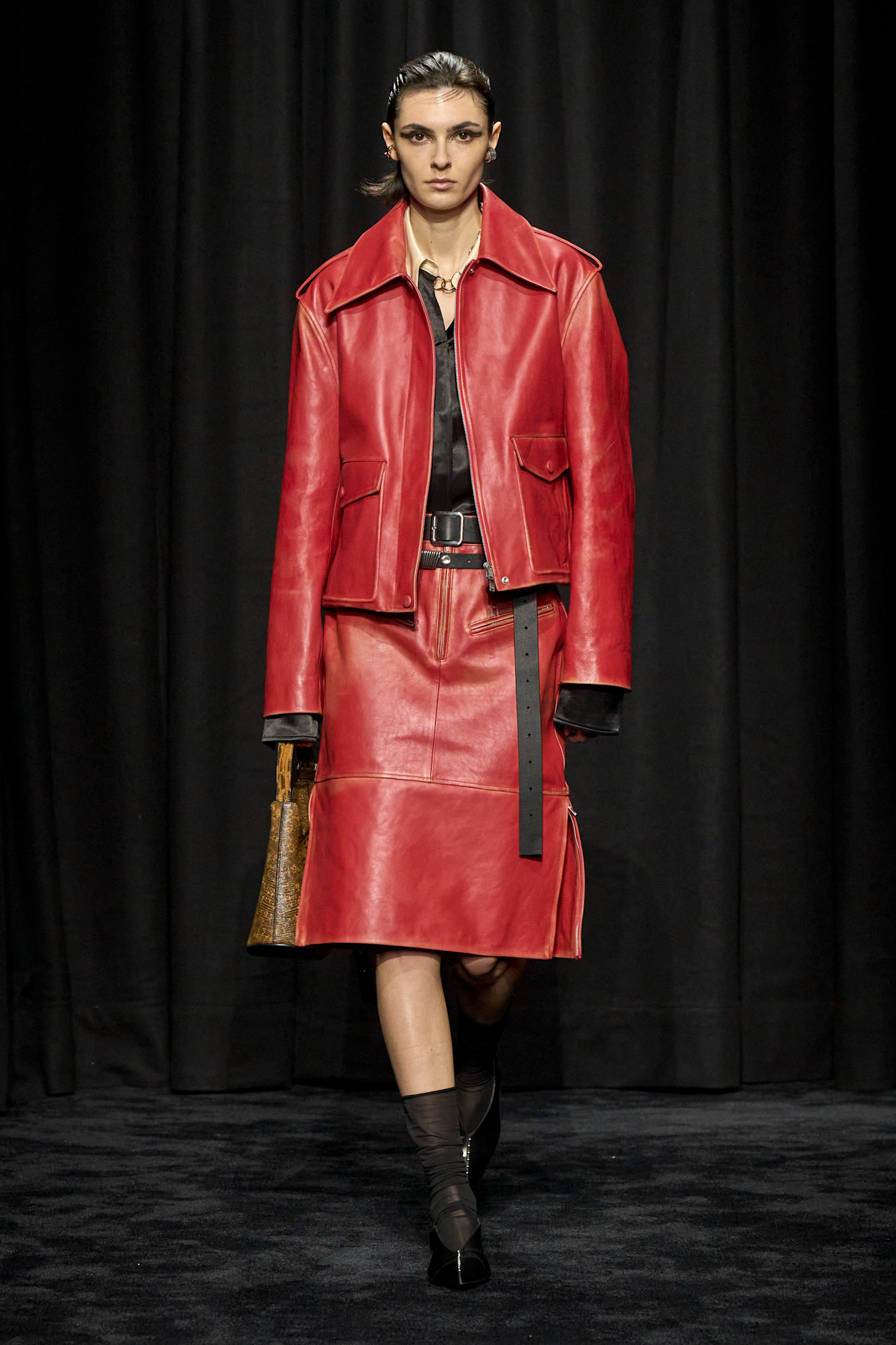 WINTER 2025 SKIRT TRENDS: RED SKIRTS AT JIL SANDER