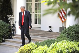 President Donald Trump arrives to announce his decision regarding the United States' participation in the Paris climate agreement in the Rose Garden at the White House June 1, 2017.