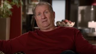 Ed O'Neill in a confessional in Modern Family looking bewildered.