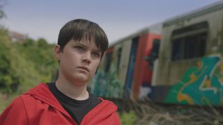 Luka bunks off school to spend time in a disused railway station.