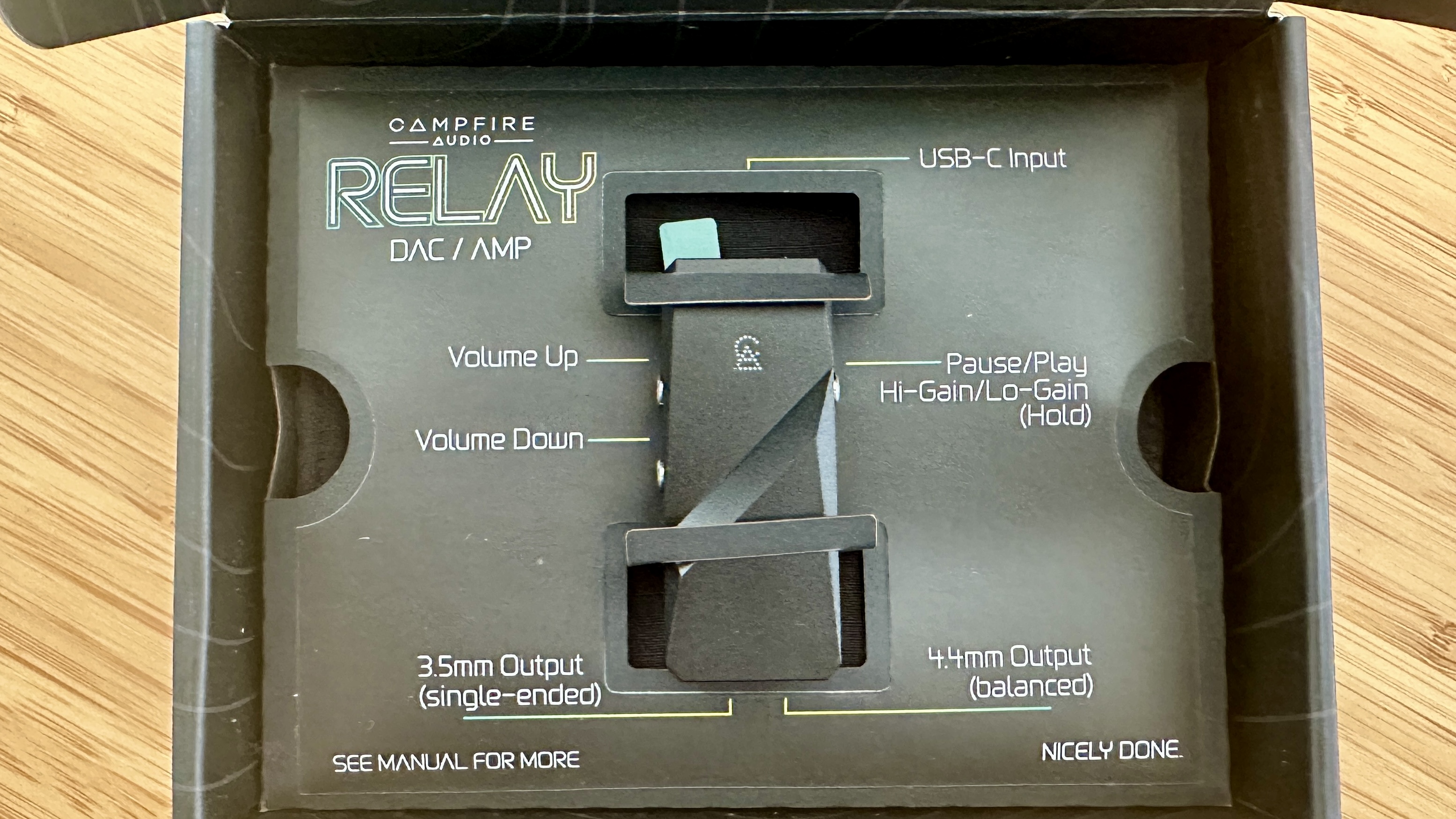 Campfire Audio Relay headphone DAC box displaying button functions