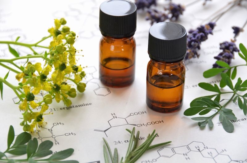 Small brown bottles contain essential oils