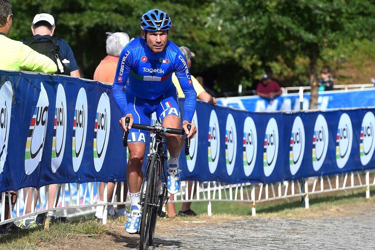 Italian national selector Davide Cassani gets a feel for the course