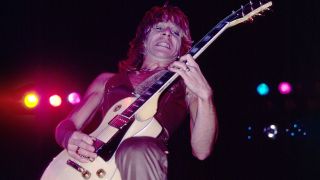 American Heavy Metal musician Randy Rhoads (1956-1982) plays guitar as he performs, during the 'Blizzard of Ozz Tour,' at Nassau Coliseum, Uniondale, New York, August 14, 1981. It was Ozzy Osbourne's debut concert tour as a solo artist after having been fired by the English group Black Sabbath the year prior. (Photo by Gary Gershoff/Getty Images)