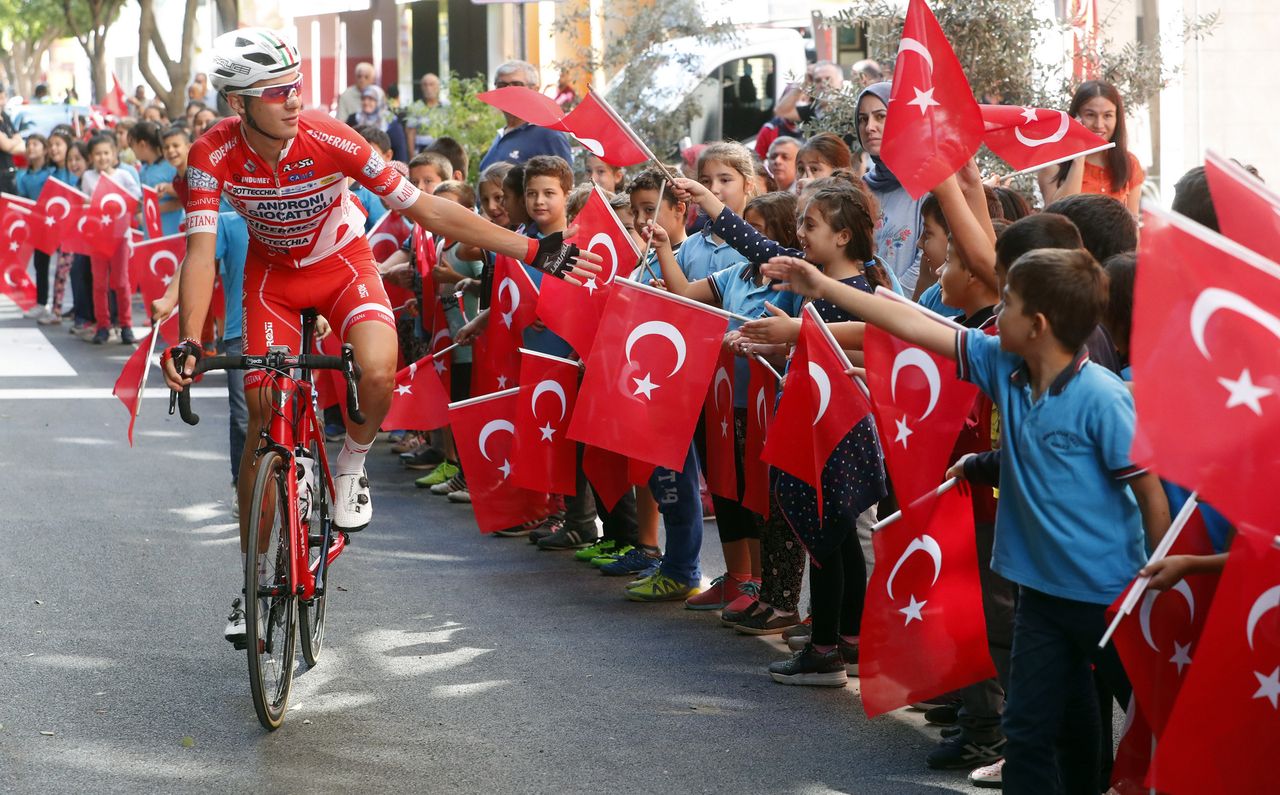 Schoolchildren greet the riders in Turkey