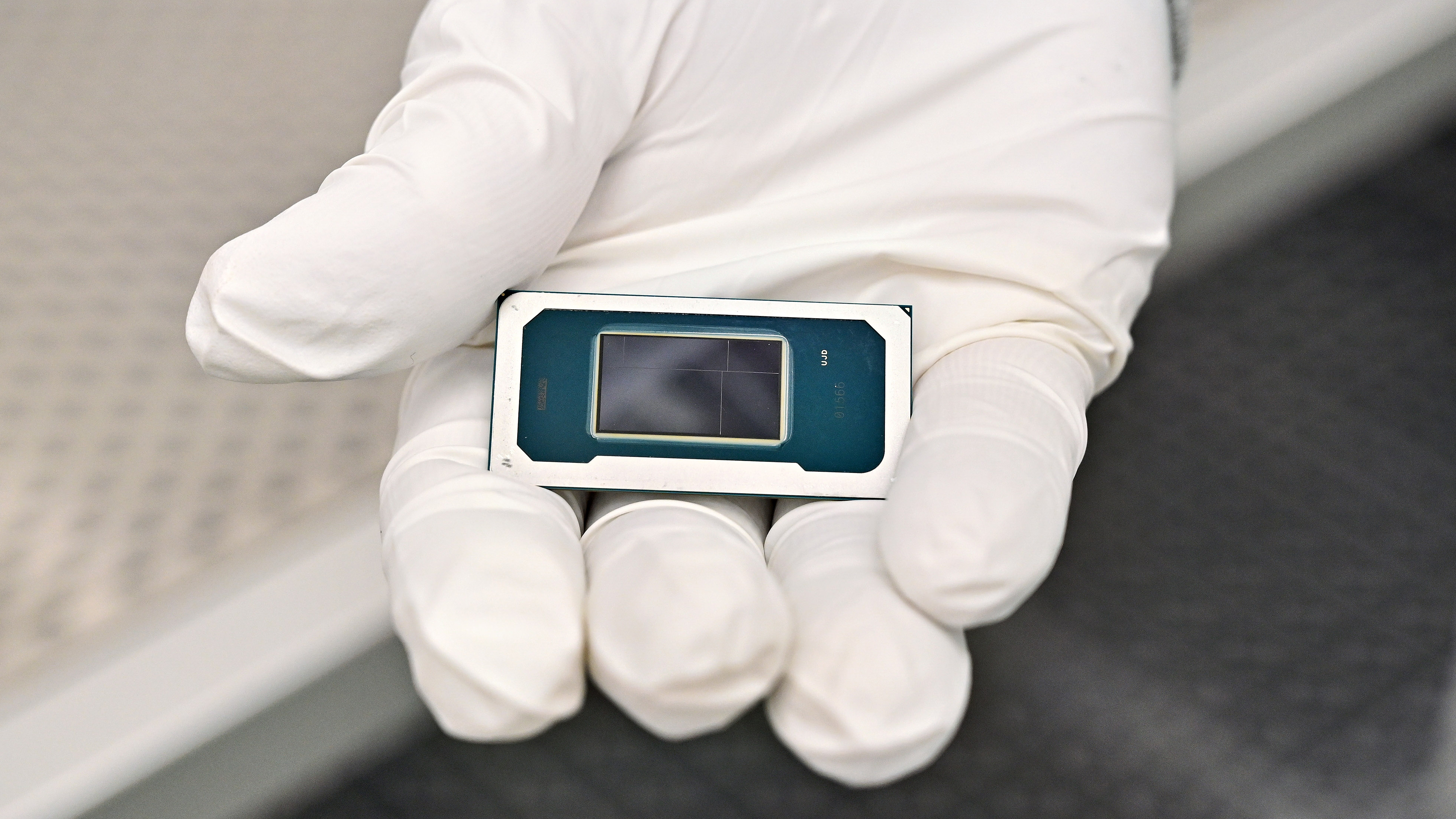 A hand holding an Intel Panther Lake processor