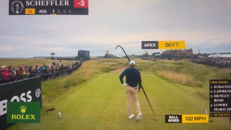 Scottie Scheffler tops his tee shot at The Open