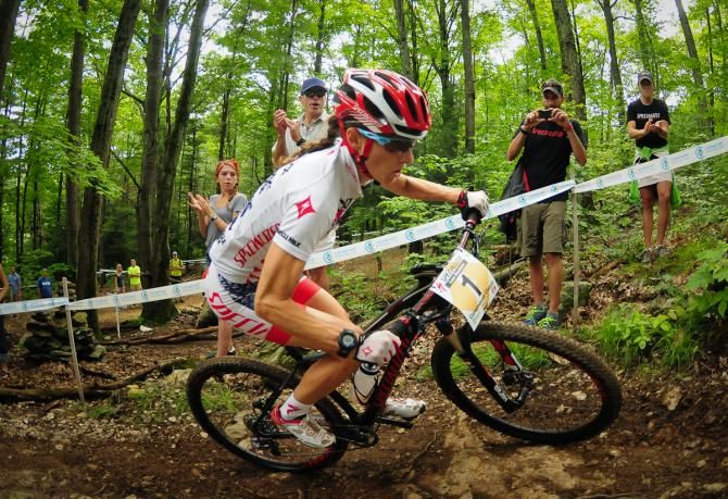 Lea Davison (Specialized) riding uphill switchbacks with ease