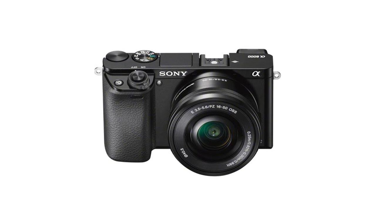 Front view of the Sony A6000 on a white background.