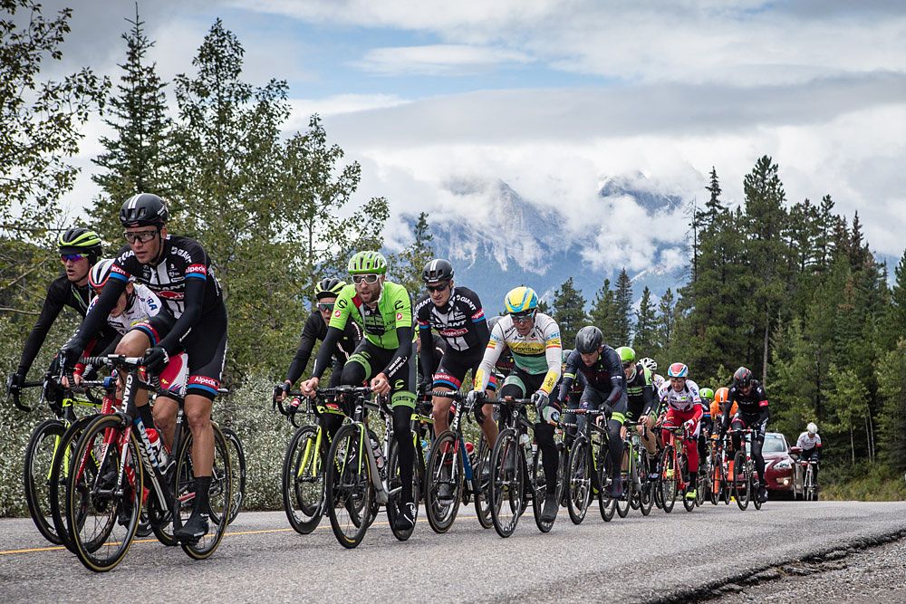 The peloton approaches the mountains in Jasper National Park during stage 3 at the Tour of Alberta
