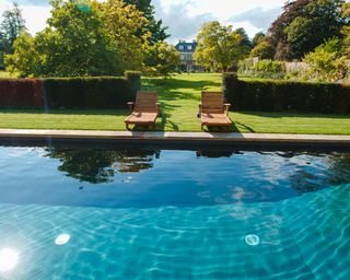 Swimming pool in country garden