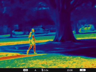 Night vision image of a person running taken on a Pulsar Telos XQ35