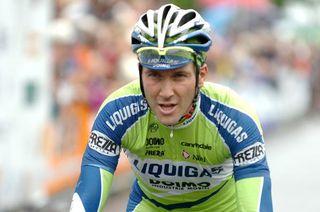 Ivan Basso solos to the win in Italy