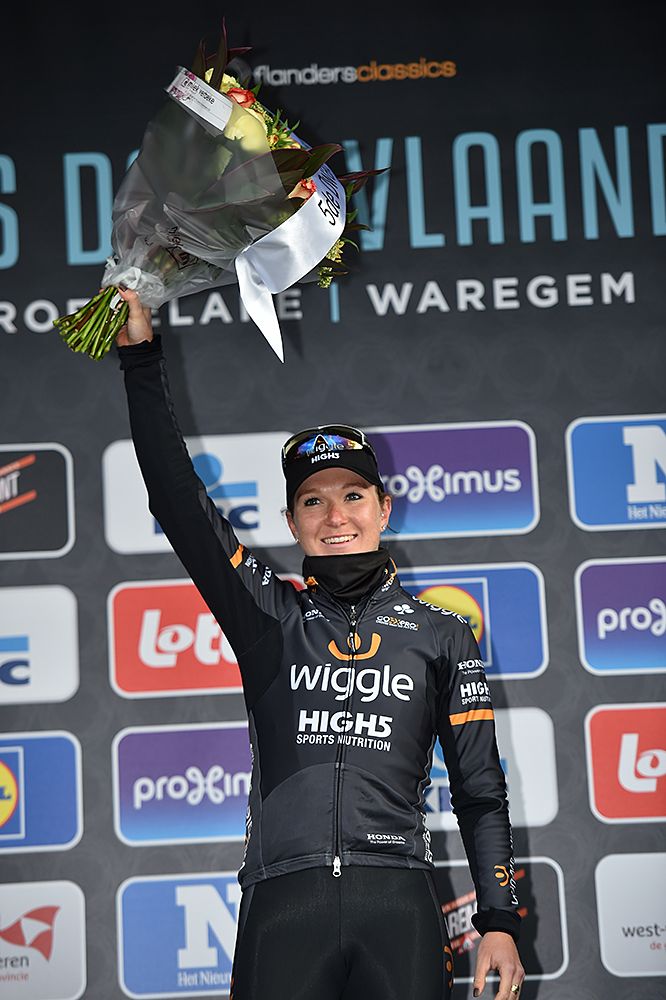 Amy Pieters (Wiggle High5) stands on the podium