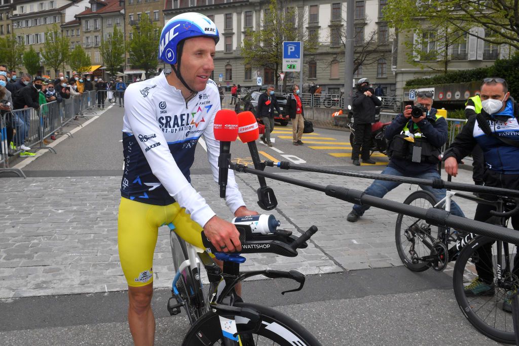 FRIBOURG SWITZERLAND MAY 02 Michael Woods of Canada and Team Israel StartUp Team Yellow Leader Jersey at arrival during the 74th Tour De Romandie 2021 Stage 5 a 1619km Individual Time Trial stage from Fribourg to Fribourg 614m Press Media Interview Social distancing ITT TDR2021 TDRnonstop UCIworldtour on May 02 2021 in Fribourg Switzerland Photo by Luc ClaessenGetty Images