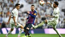 Barcelona’s Lionel Messi in action against Real Madrid’s Sergio Reguilon and Sergio Ramos