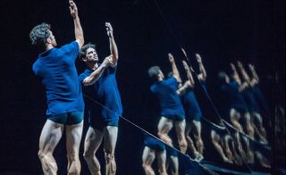 tree of code performance with men dressed in blue