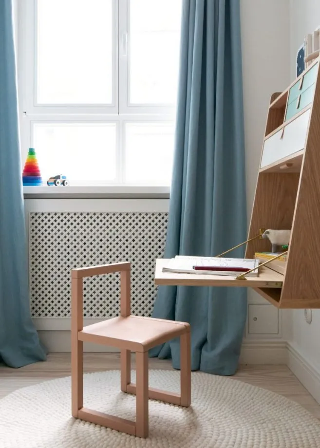 kids desk area with a pull-down desk which is wall mounted