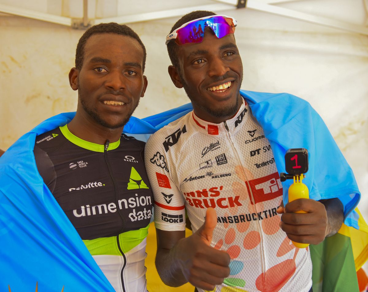Tour of Rwanda winner Joseph Areruya and stage seven winner Valens Ndayisenga after the final stage of the race in Kigali