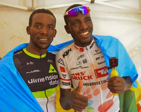 Tour of Rwanda winner Joseph Areruya and stage seven winner Valens Ndayisenga after the final stage of the race in Kigali