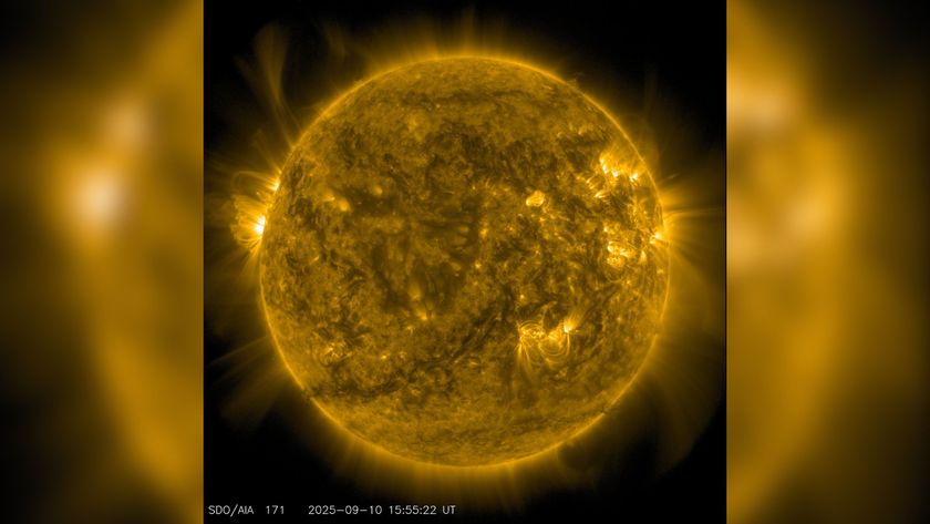A close up of the sun, in ultraviolet light, showing rays of heat and solar flares
