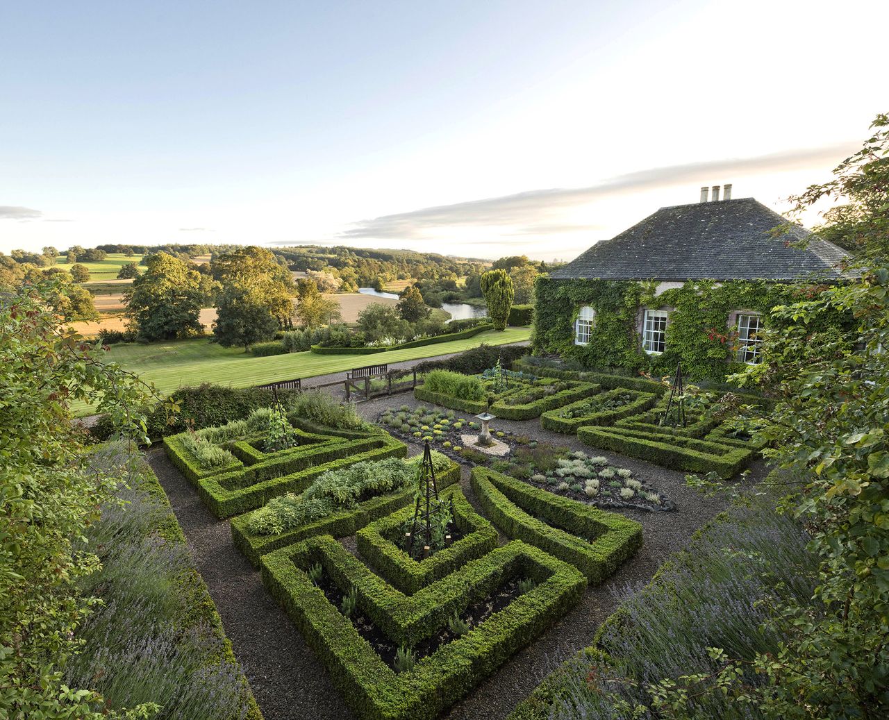 The house and rose garden at Monteviot, looking down towards the river. © Andrea Jones/Garden Exposures Photo Library